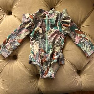 Bathing suit size 3-6 months. Never used.  Brand: Cotton on Kids